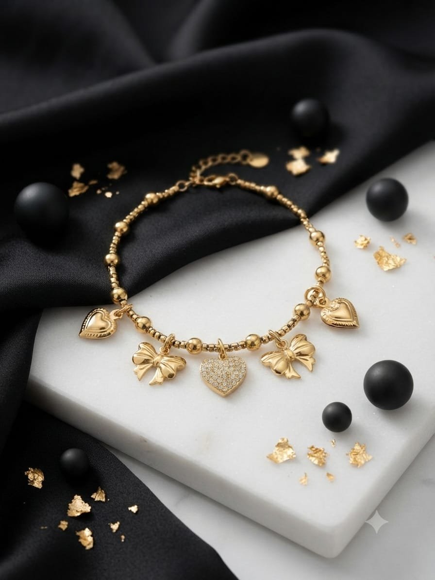 Bracelet Amour Strass cœur pavé cristaux nœuds papillon dorés acier inoxydable